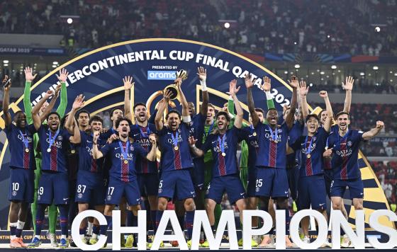 Players ofParis Saint-Germain celebrate with the trophy after winning the FIFA Intercontinental Cup 2025 match between Paris Saint-Germain and CR Flamengo at Ahmad Bin Ali Stadium in Al-Rayyan, Qatar, 17 December 2025. 