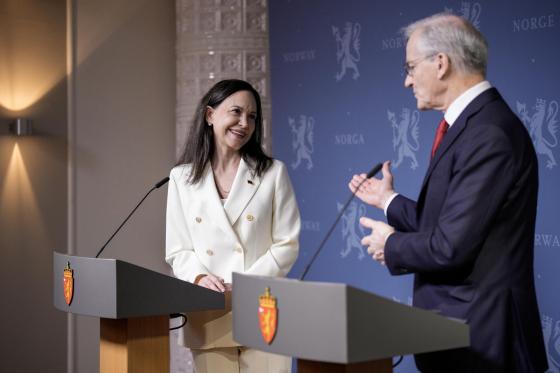 Norway's Prime Minister Jonas Gahr Store (R) and Nobel Peace Prize laureate Maria Corina Machado (L) speak during a press conference at the government's representative facilities in Oslo, Norway, 11 December 2025. 